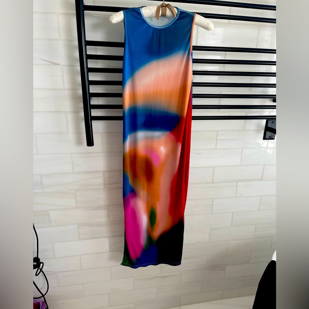 Very cute colorful dress. Size M